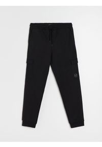 Sinsay - Spodnie dresowe cargo - czarny. Kolor: czarny. Materiał: dresówka