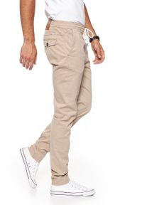 Wrangler - WRANGLER SPODNIE MĘSKIE DRAWSTRING CHINO CAMEL WASHED W16DP749J $. Materiał: materiał