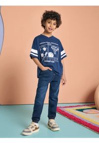 Sinsay - Spodnie jeansowe - granatowy. Kolor: niebieski. Materiał: jeans