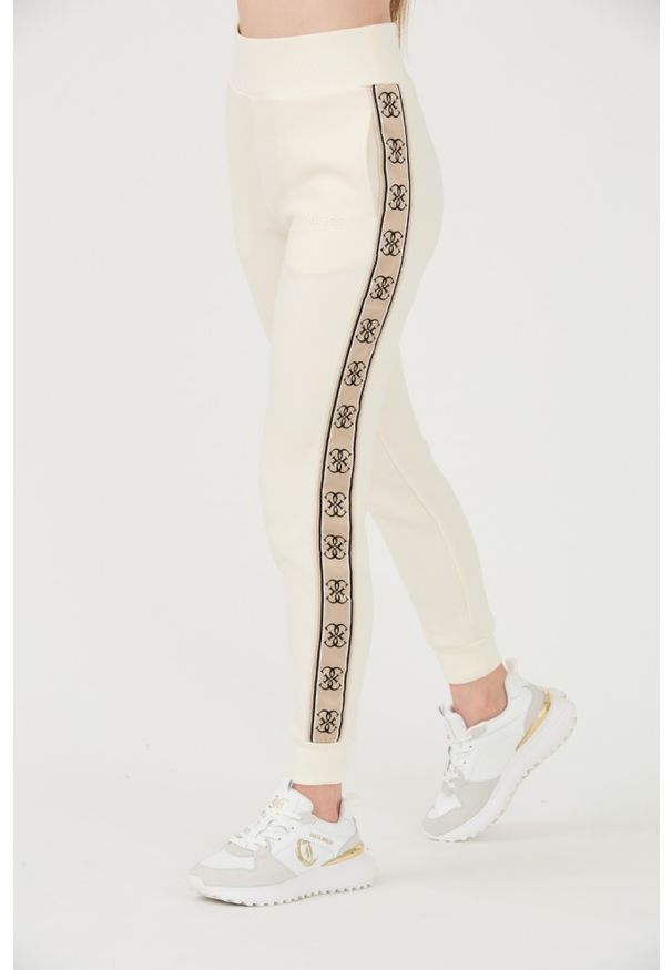 Guess - GUESS Beżowe damskie spodnie dresowe Britney Jogger, Rozmiar XL. Kolor: beżowy. Materiał: dresówka
