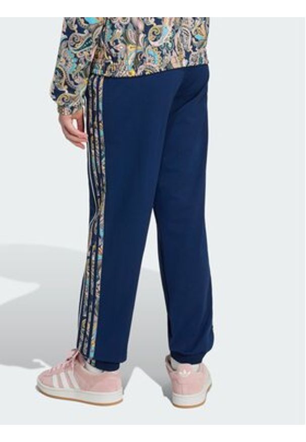 Adidas - adidas Spodnie dresowe Sst KR9187 Granatowy Loose Fit. Kolor: niebieski. Materiał: syntetyk