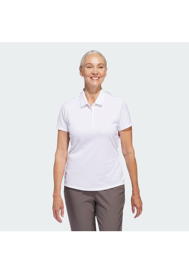 Adidas - Koszulka polo Women's Solid Performance Short Sleeve. Typ kołnierza: polo. Kolor: biały. Materiał: materiał. Styl: klasyczny