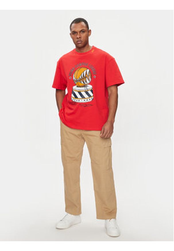 Puma T-Shirt Showtime 624740 Czerwony Regular Fit. Kolor: czerwony. Materiał: bawełna