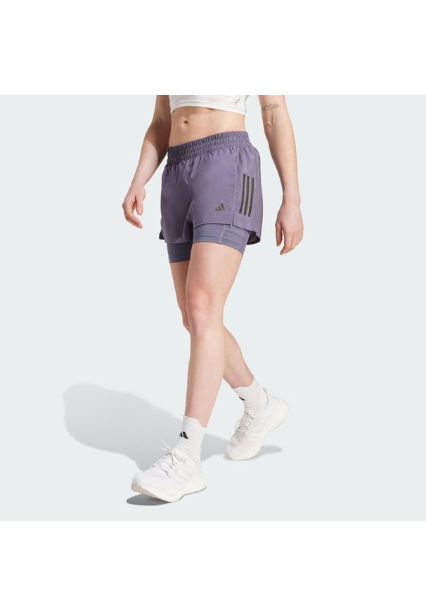 Adidas - Szorty Own the Run Climacool 2-in-1. Kolor: fioletowy. Technologia: ClimaCool (Adidas). Sport: bieganie