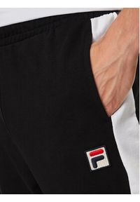 Fila Spodnie dresowe FAM0612 Czarny Regular Fit. Kolor: czarny. Materiał: bawełna #5