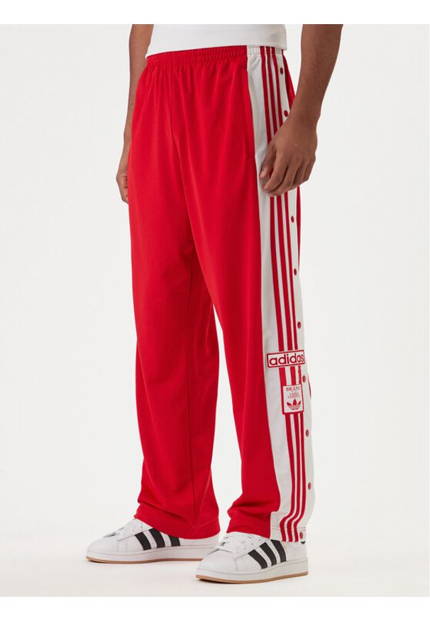 Adidas - adidas Spodnie dresowe Adibreak Classic KD4093 Czerwony Regular Fit. Kolor: czerwony. Materiał: syntetyk