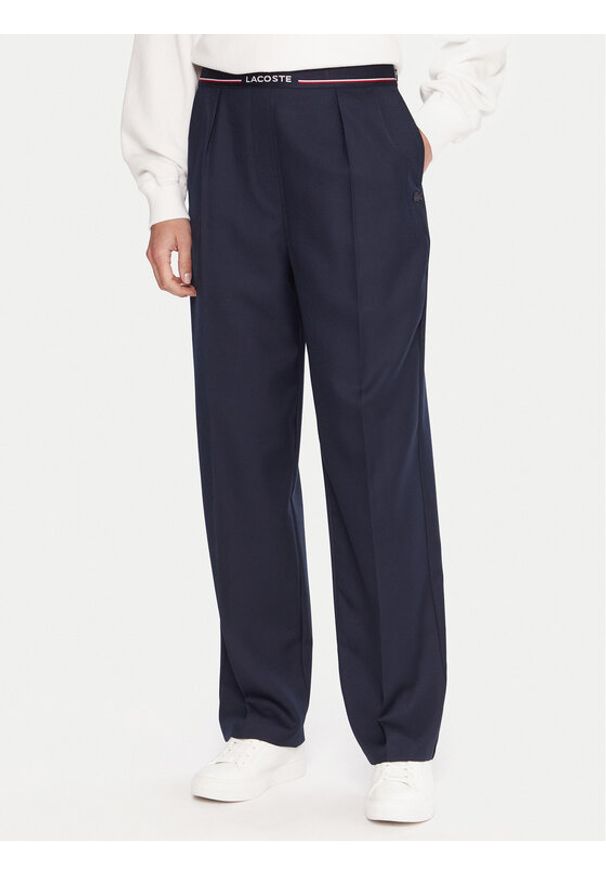 Lacoste Spodnie materiałowe HF5307 Granatowy Relaxed Fit. Kolor: niebieski. Materiał: syntetyk
