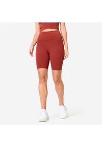 Decathlon - Legginsy krótkie fitness damskie Domyos. Kolor: czerwony, brązowy, wielokolorowy. Materiał: poliamid, elastan, materiał. Długość: krótkie. Sport: fitness