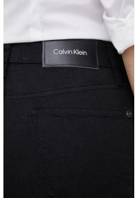Calvin Klein jeansy damskie high waist. Stan: podwyższony. Kolor: czarny