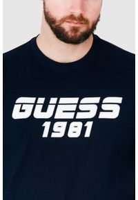 Guess - GUESS Granatowy t-shirt męski z odblaskowym logo, Rozmiar S. Kolor: niebieski #5