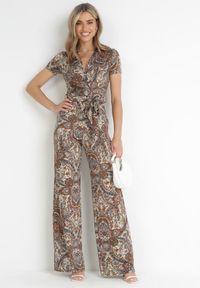Born2be - Brązowy Kwiecisty Kombinezon z Kopertowym Dekoltem i Materiałowym Paskiem Catarinja. Kolor: brązowy. Materiał: materiał. Styl: boho #4