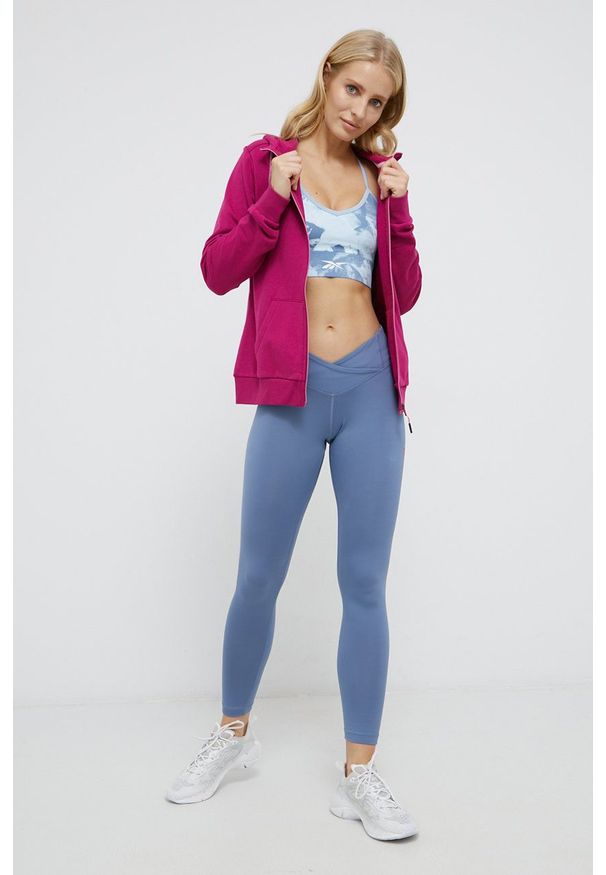 Reebok Legginsy damskie z nadrukiem. Kolor: niebieski. Materiał: dzianina, skóra. Wzór: nadruk