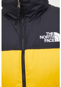 The North Face bezrękawnik puchowy męski kolor żółty zimowy. Typ kołnierza: kaptur. Kolor: żółty. Materiał: puch. Długość rękawa: bez rękawów. Sezon: zima #8
