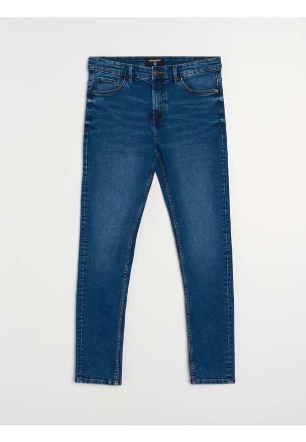 Sinsay - Jeansy skinny z efektem sprania - granatowy. Kolor: niebieski