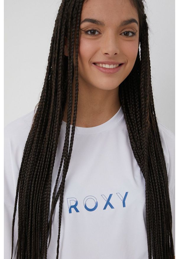 Roxy t-shirt damski kolor biały. Kolor: biały. Materiał: materiał. Długość rękawa: krótki rękaw. Długość: krótkie. Wzór: nadruk