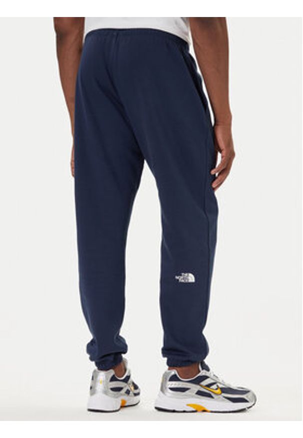 The North Face Spodnie dresowe Simple Dome NF0A8C1W Granatowy Regular Fit. Kolor: niebieski. Materiał: syntetyk