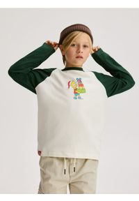 Reserved - Longsleeve The Simpsons - złamana biel. Materiał: dzianina, bawełna. Długość rękawa: długi rękaw #1