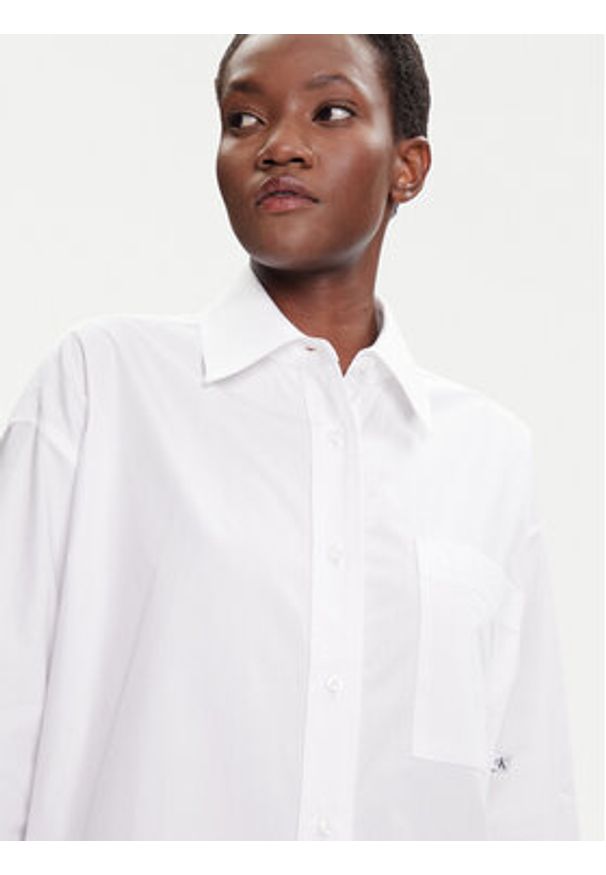 Calvin Klein Jeans Sukienka koszulowa LV047C022G Biały Oversize. Kolor: biały. Materiał: bawełna. Typ sukienki: koszulowe, oversize