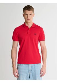 Big-Star - Koszulka męska polo czerwona Polian 603. Typ kołnierza: polo. Kolor: czerwony. Materiał: dzianina, jeans. Długość: krótkie. Wzór: aplikacja, haft. Sezon: lato. Styl: sportowy, wakacyjny, klasyczny, elegancki