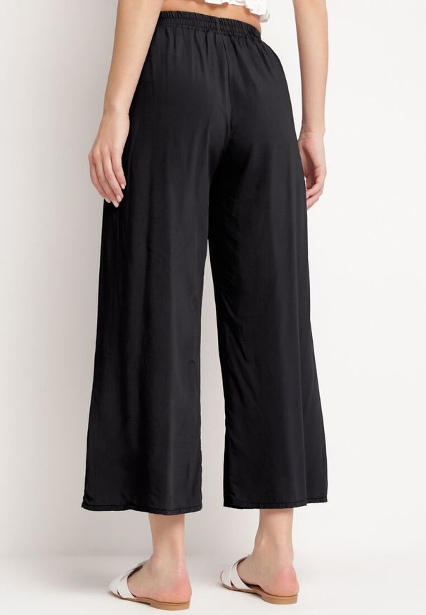 Born2be - Czarne Bawełniane Spodnie z Szerokimi Nogawkami Palazzo z Gumką w Pasie Nesira. Okazja: na co dzień, na spacer. Kolor: czarny. Materiał: bawełna. Styl: casual, boho