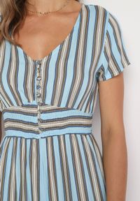 Born2be - Niebieski Wiskozowy Kombinezon z Guzikami przy Dekolcie i Elastyczną Gumką w Talii Tinaleias. Okazja: na co dzień, do pracy. Kolor: niebieski. Materiał: wiskoza. Długość: długie. Wzór: aplikacja. Styl: klasyczny, casual #7