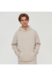 House - Gładka bluza z kapturem regular fit beżowa - Kremowy. Typ kołnierza: kaptur. Kolor: kremowy. Wzór: gładki #1