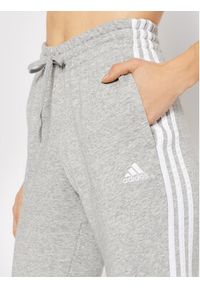 Adidas - adidas Spodnie dresowe Essentials French Terry 3-Stripes GM8735 Szary Slim Fit. Kolor: szary. Materiał: bawełna #3