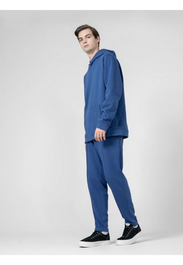 outhorn - Spodnie dresowe męskie - niebieskie. Kolor: niebieski. Materiał: dresówka