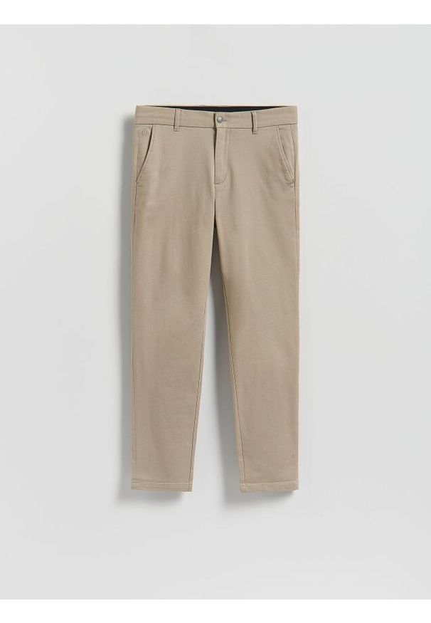 Reserved - Bawełniane spodnie slim fit - beżowy. Kolor: beżowy. Materiał: bawełna
