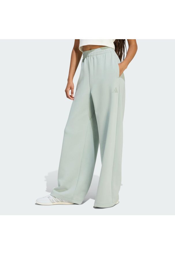 Adidas - Spodnie Soft Lux Straight Leg. Kolor: zielony. Materiał: materiał. Sport: fitness