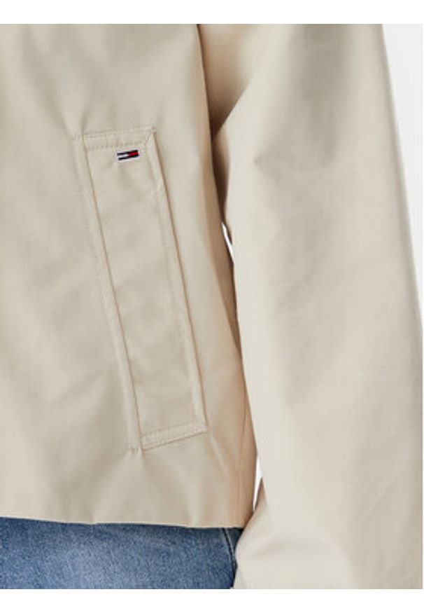 Tommy Jeans Trencz DW0DW21348 Beżowy Regular Fit. Kolor: beżowy. Materiał: bawełna