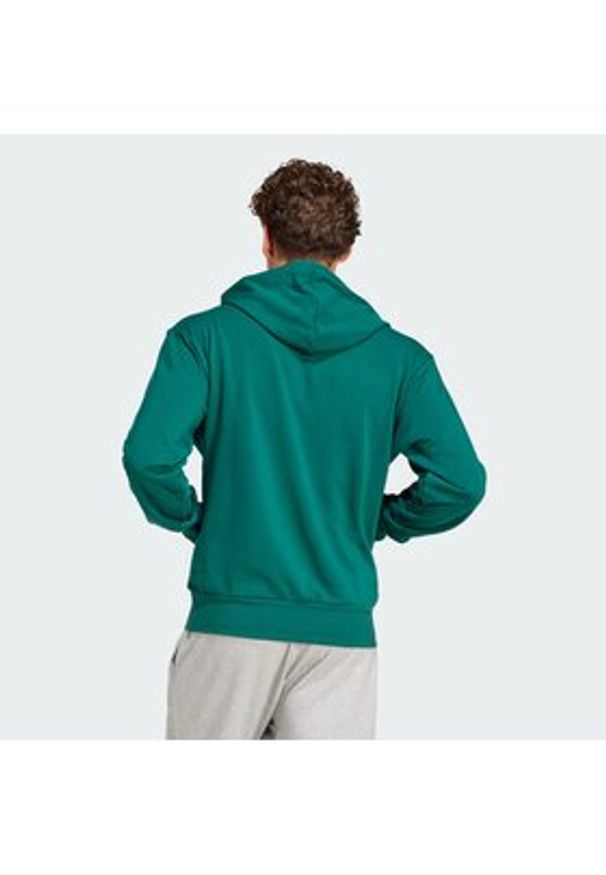 Adidas - adidas Bluza Essentials Feel Cozy JE3841 Zielony Regular Fit. Kolor: zielony. Materiał: bawełna