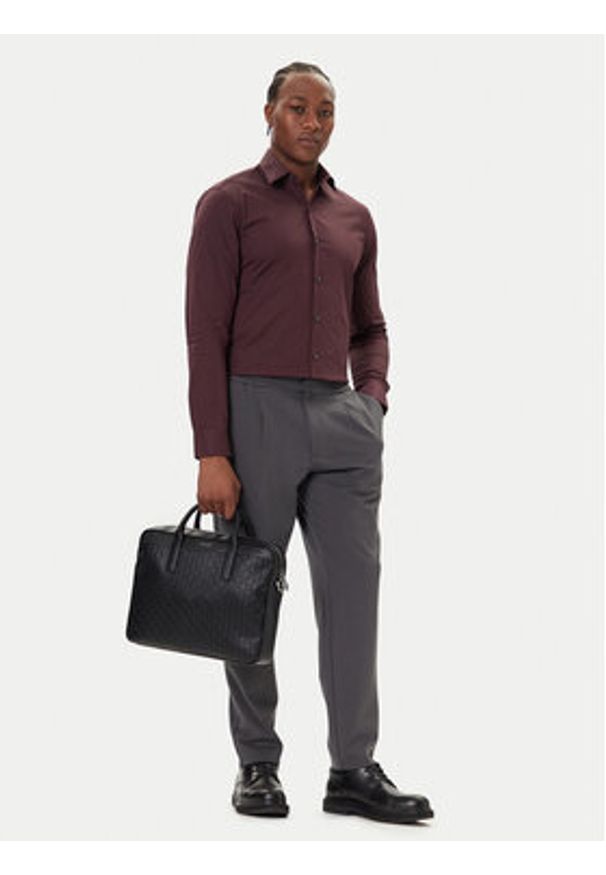 Calvin Klein Torba na laptopa Emblem Emboss Commuter LV04D3265G Czarny. Kolor: czarny. Materiał: skóra