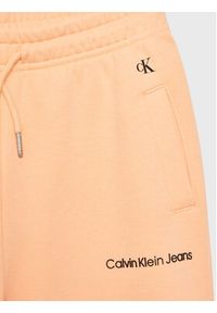 Calvin Klein Jeans Spodnie dresowe Logo IG0IG01509 Pomarańczowy Relaxed Fit. Kolor: pomarańczowy. Materiał: bawełna #3