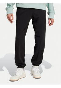 Adidas - adidas Spodnie dresowe Premium Essentials IY2245 Czarny Loose Fit. Kolor: czarny. Materiał: bawełna #1