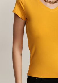 Renee - Żółty T-shirt Mirasura. Kolor: żółty. Materiał: dzianina. Długość rękawa: krótki rękaw. Długość: krótkie. Wzór: gładki