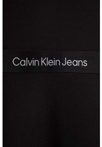 Calvin Klein Jeans sukienka kolor czarny midi rozkloszowana. Kolor: czarny. Materiał: materiał, wiskoza. Długość rękawa: krótki rękaw. Typ sukienki: rozkloszowane. Styl: klasyczny. Długość: midi #3
