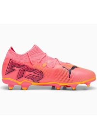 Buty piłkarskie Puma Future 7 Match FG/AG Jr 107729-03 różowe. Kolor: różowy. Materiał: syntetyk, dzianina. Szerokość cholewki: normalna. Sport: piłka nożna