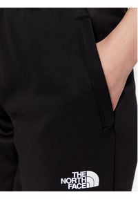 The North Face Spodnie dresowe Reaxion NF0A7ZAB Czarny Regular Fit. Kolor: czarny. Materiał: syntetyk #3