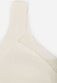 Renee - Biały Sportowy Biustonosz z Usztywnieniem Ozdobiony Siateczkową Wstawką Edalissa. Kolor: biały. Rodzaj stanika: wyciągane miseczki. Wzór: aplikacja #3