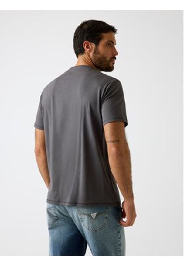 Guess T-Shirt 180293 Beżowy Classic Fit. Kolor: beżowy