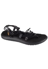 Sandał Teva W Voya Infinity Sandals W 1019622-BLK czarne. Okazja: na spacer. Zapięcie: sznurówki. Kolor: czarny. Materiał: skóra. Sezon: lato. Sport: turystyka piesza