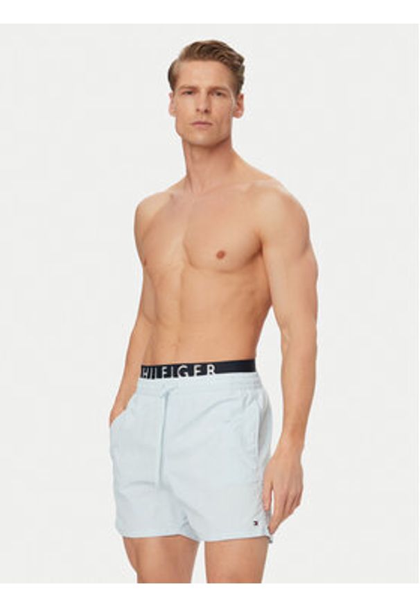 TOMMY HILFIGER - Tommy Hilfiger Szorty kąpielowe UM0UM03749 Niebieski jasny Regular Fit. Kolor: niebieski. Materiał: syntetyk
