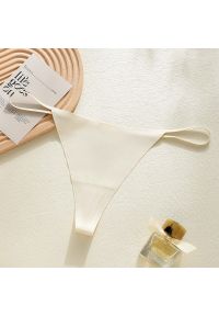 Intica - Stringi bezszwowe mini do obcisłych ubrań Benita. Kolor: beżowy. Materiał: materiał