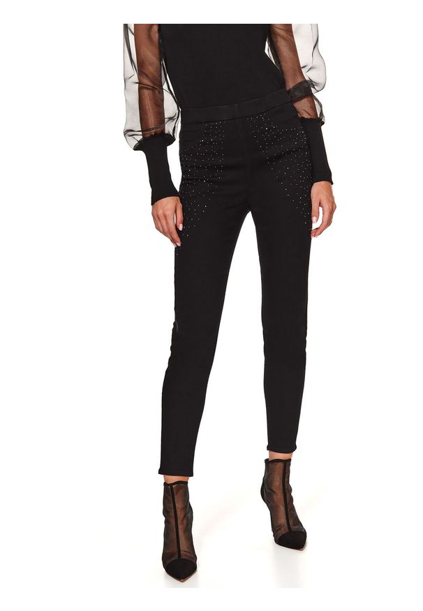 TOP SECRET - Jeansowe spodnie z gumą w pasie i aplikacją. Kolor: czarny. Materiał: guma, jeans. Długość: długie. Wzór: aplikacja. Sezon: zima. Styl: elegancki