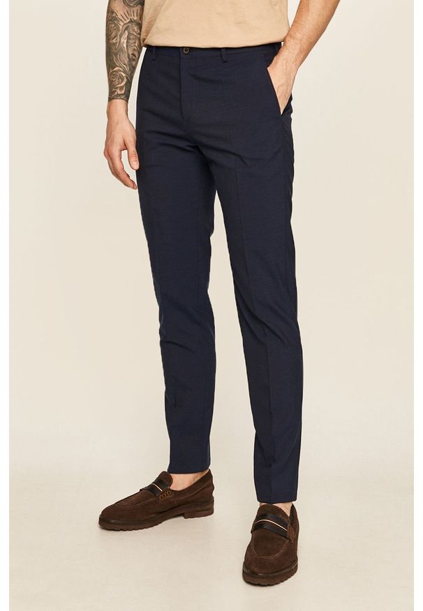 Tommy Hilfiger Tailored - Spodnie. Okazja: na co dzień. Kolor: niebieski. Materiał: wełna, bawełna, materiał, wiskoza, tkanina, poliester. Wzór: gładki. Styl: casual