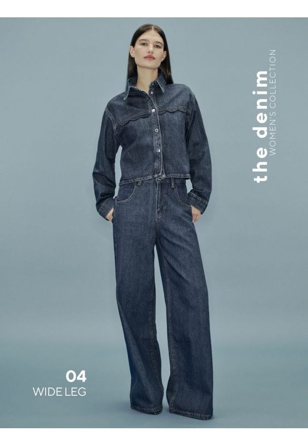 Reserved - Jeansy wide leg z ozdobnymi kieszeniami - niebieski. Kolor: niebieski