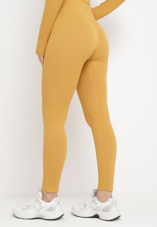 Born2be - Żółte Legginsy z Elastycznej Prążkowanej Dzianiny Ichorsa. Kolor: żółty. Materiał: dzianina, prążkowany