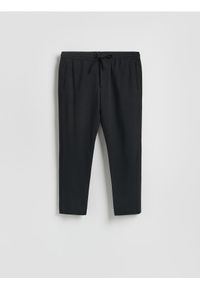 Reserved - Spodnie joggery - czarny. Kolor: czarny. Materiał: tkanina, wiskoza #1