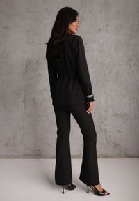 Renee - Czarny Komplet o Garniturowym Kroju z Marynarką z Wiązaniem i Spodniami Falestra. Kolor: czarny #6